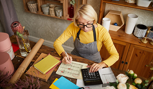 Business owner preparing corporate taxes